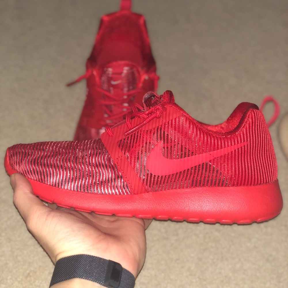 All red Nike Roshe